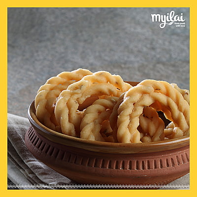 Bowl of KAI MURUKKU in centre with myilai logo on top