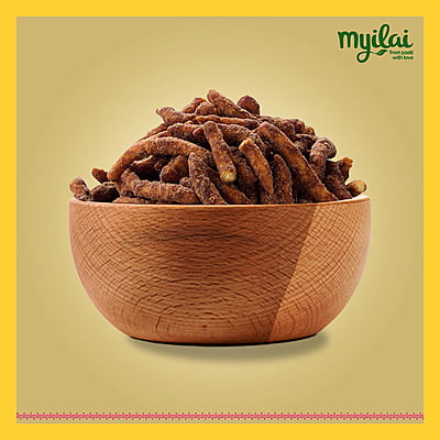 A bowl of Karupatti Sev is placed in the centre with myilai logo